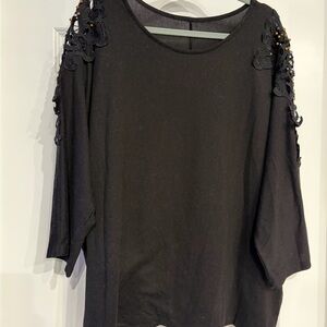 Elegant Black Women's Top with Embellished Sleeves
